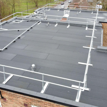 Flat roof covering renewal, new safety rails and cable trays to block in South London.